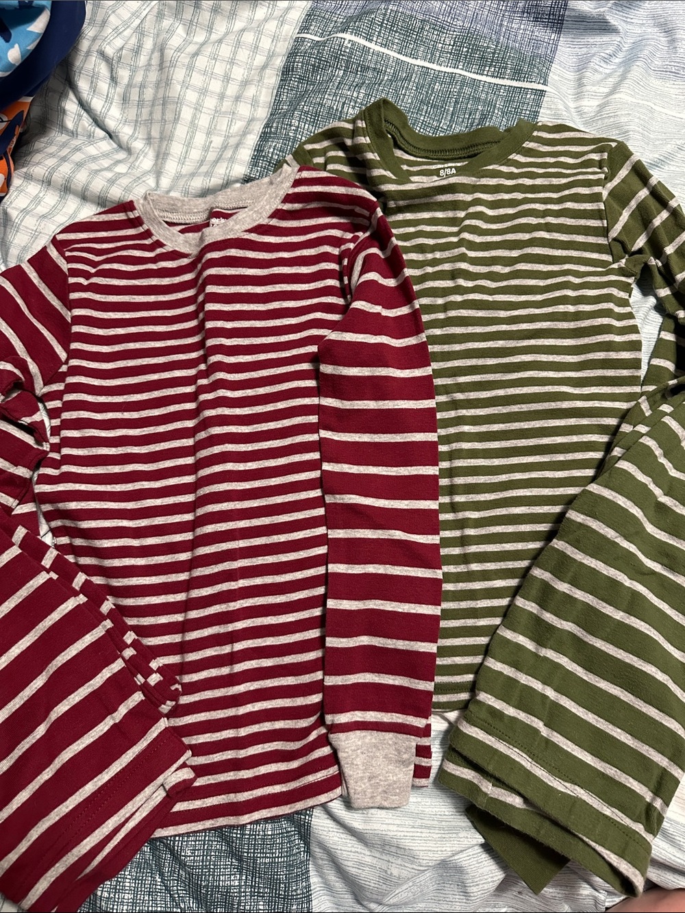 Carters boys size 8 two sets of pajamas.